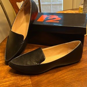 Ladies Black Flats size 7.5.   108